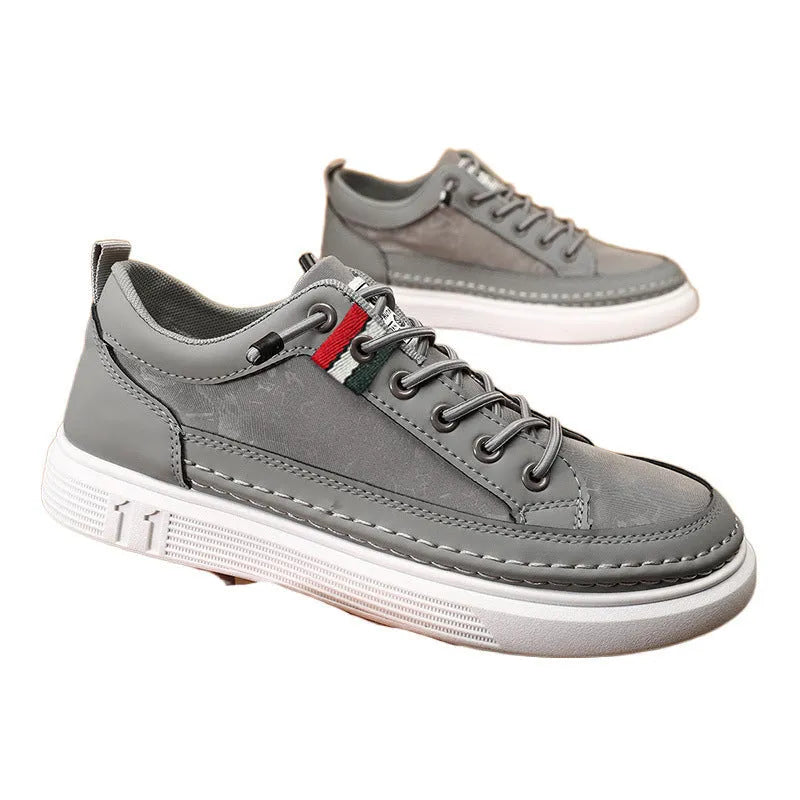 Men's grey high-top casual sneakers with round toe and PVC sole on a white background.