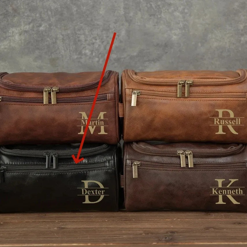Men's black PU leather travel toiletry bag for grooming storage.