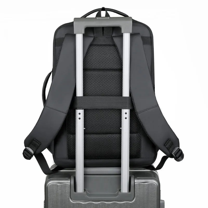 Black waterproof Oxford cloth backpack with curved shoulder strap showing 20-35 litre capacity