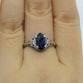 Silver women's ring with geometric hollow pattern, shown in size US7.