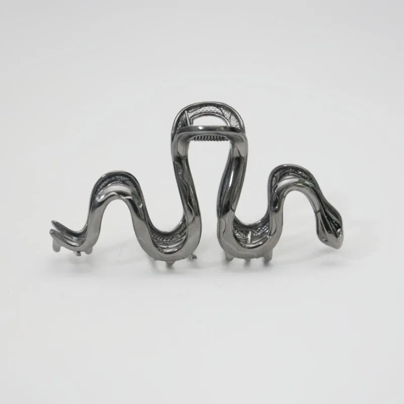 Slytherin serpentine snake design metal hair clip barrette in silver and gun black, 10.5cm long.