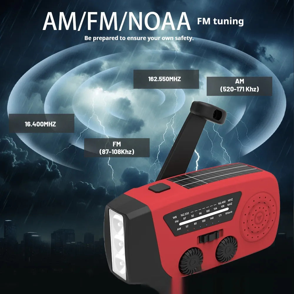 Red rechargeable emergency hand radio with built-in torch, showing compact size and wrist strap.