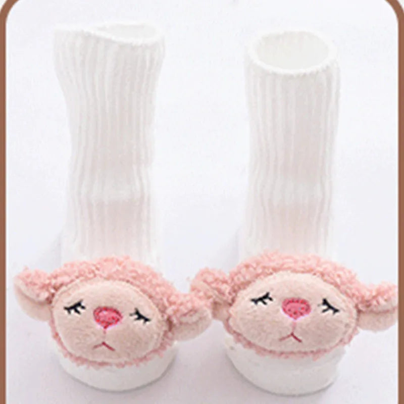 Cotton baby floor socks in a selection of colours and patterns like panda, lion, and bows, shown in sizes for infants.