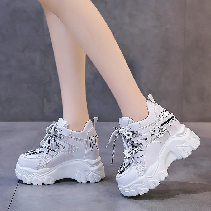 Women's white breathable mesh platform sports shoes with cross strap design and rubber sole