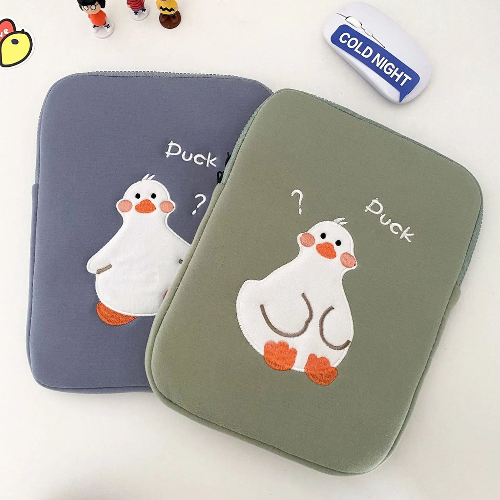 Blue cotton tablet case with cartoon duck embroidery and a zip closure, sized for an 11-inch tablet.