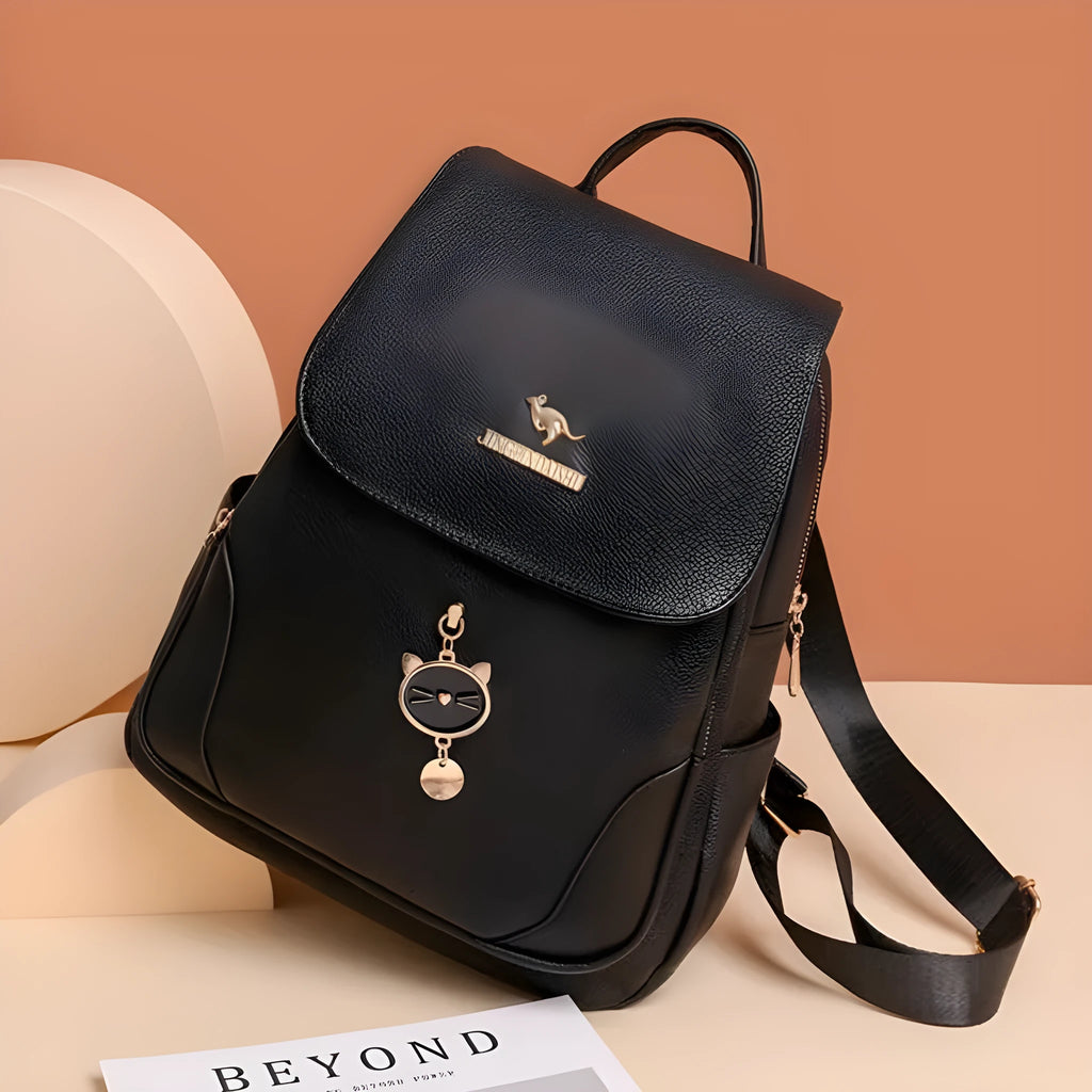 Women's casual soft PU backpack with three-dimensional front pocket in black, blue, or taro purple colours