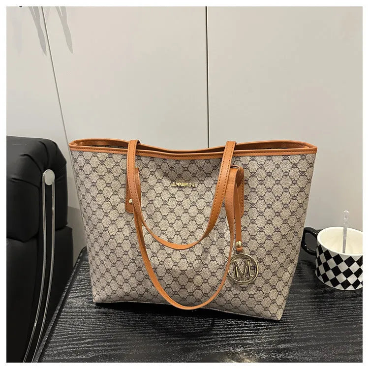 Western style shoulder bag in PU leather with sewing thread detail showing black colour option