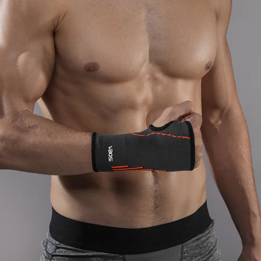 Adult wristband wrist guard for tennis in black, green or orange, single pack, sizes L M XL