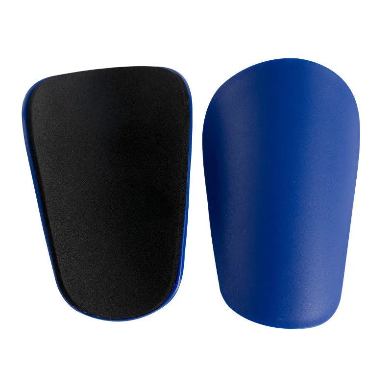 PU mini shin guards in black, white, red and blue for football and outdoor sports