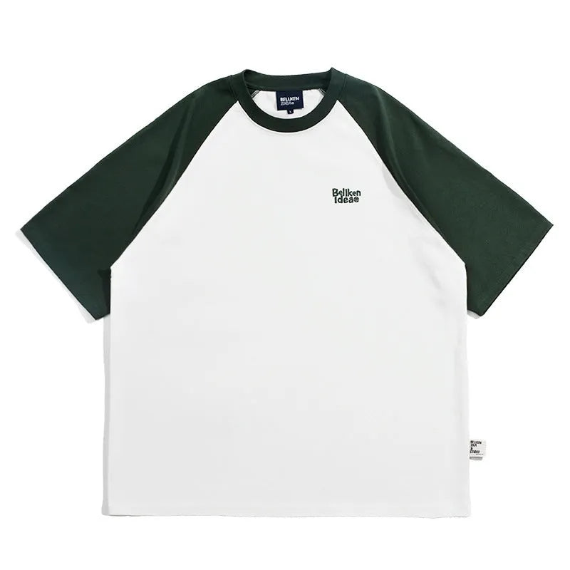 Blue Japanese-style loose men's t-shirt with raglan sleeves on a hanger