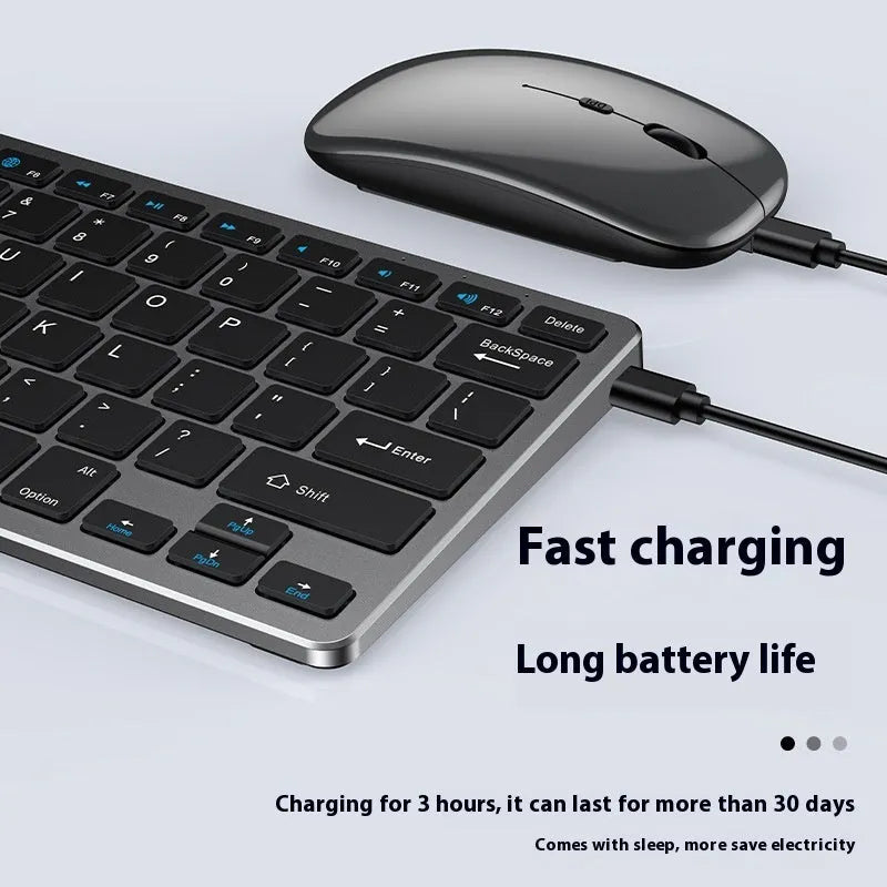 Black wireless ultra-thin keyboard and mouse combo with USB receiver and keyboard cover on a desk.