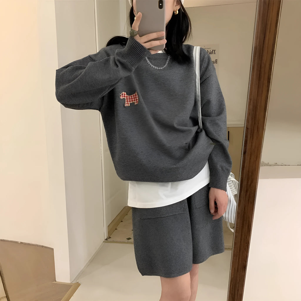 Women's milk blue knitted sweater and shorts loungewear set with embroidered animal pattern.