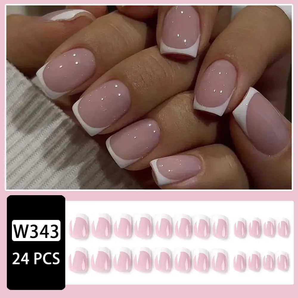 24 white fake nails with a black and grey plaid pattern, laid out as press-on nail tips.