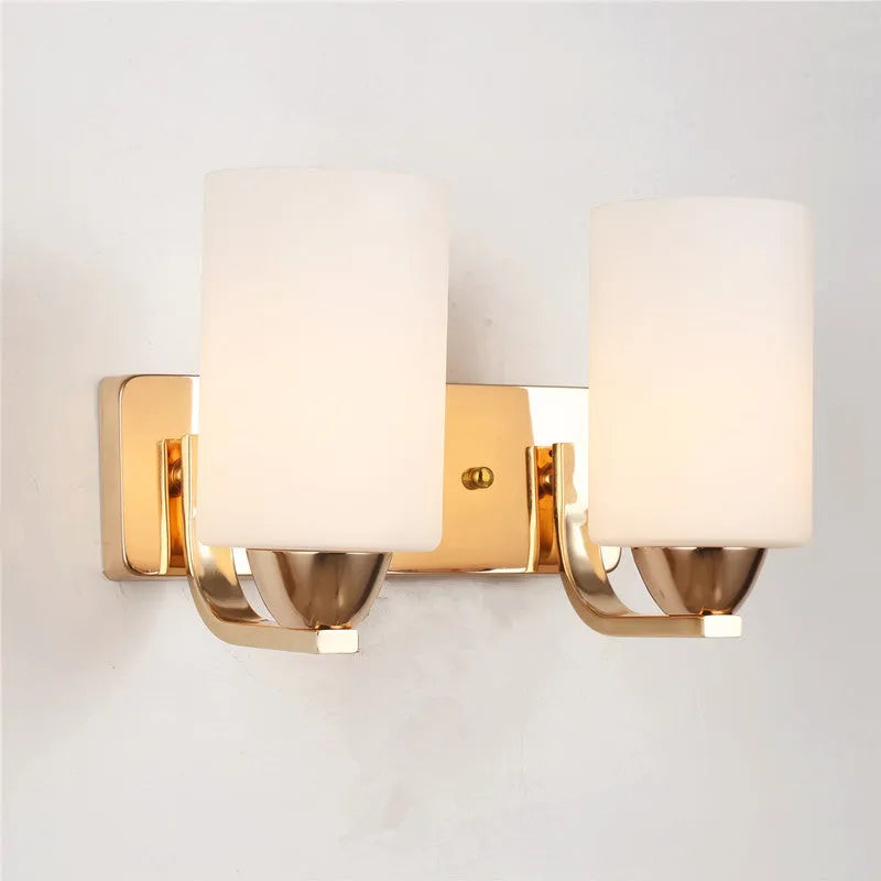 Chrome-finished glass wall lamp with minimalist design mounted on wall