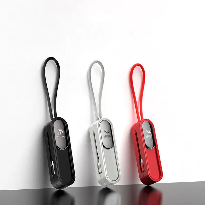 Black magnetic three-in-one charging cable with three connectors extending from single USB end