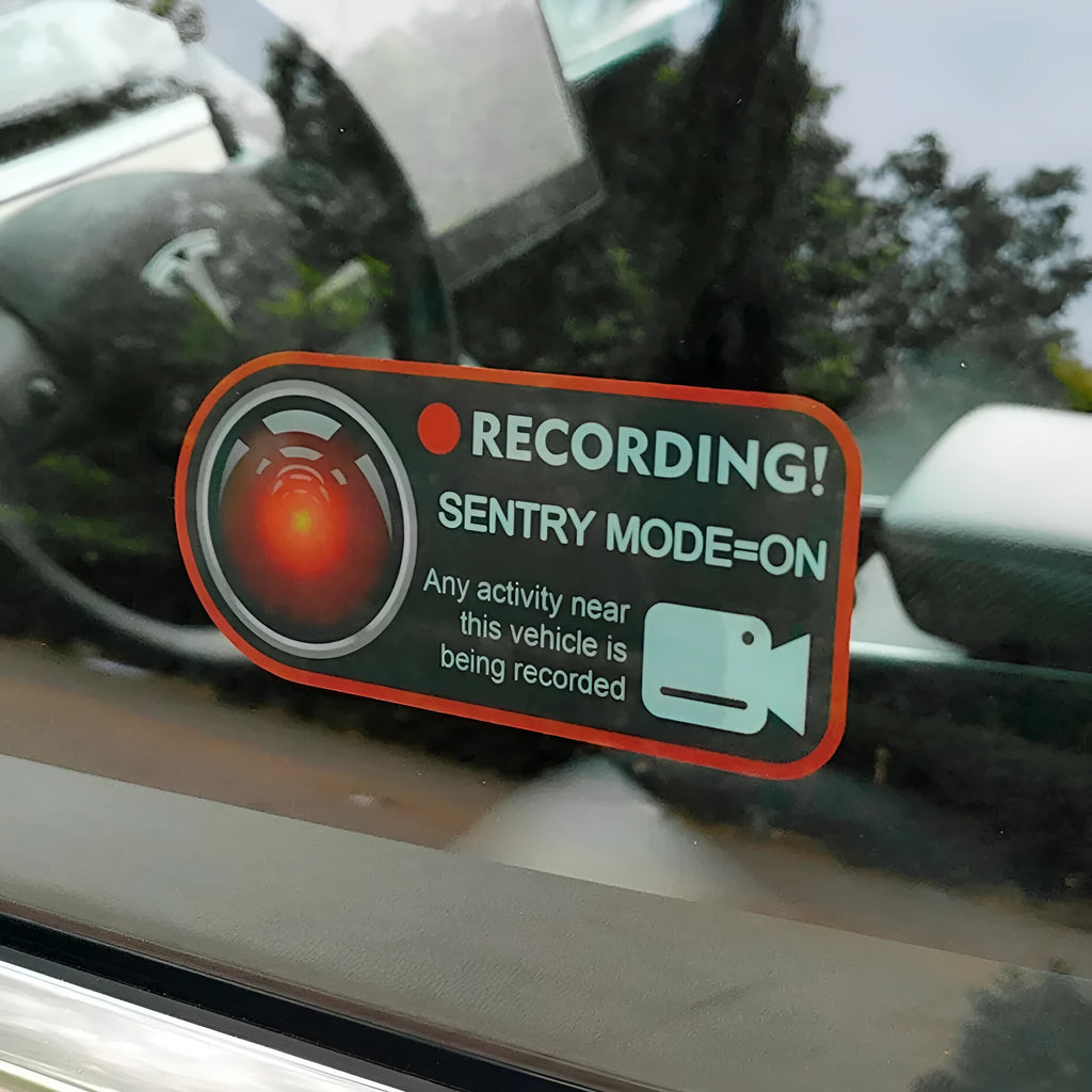 Pair of black and white electrostatic warning stickers for Tesla sentry mode, sized 11cm by 5cm.