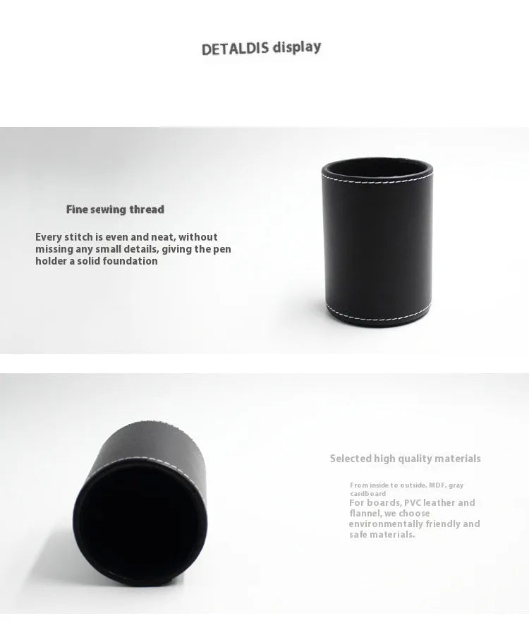 Small round black leather pen holder container on a desk