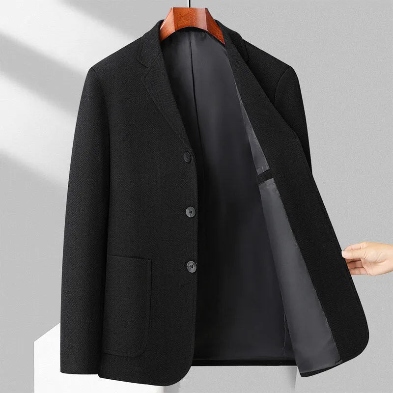 Man wearing a loose-fit solid colour wool blend casual coat for spring or autumn.