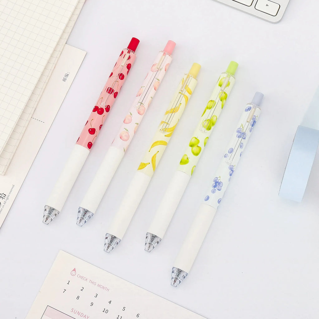 Three fruit-scented press-action pens with plastic barrels and black 0.5mm refills.