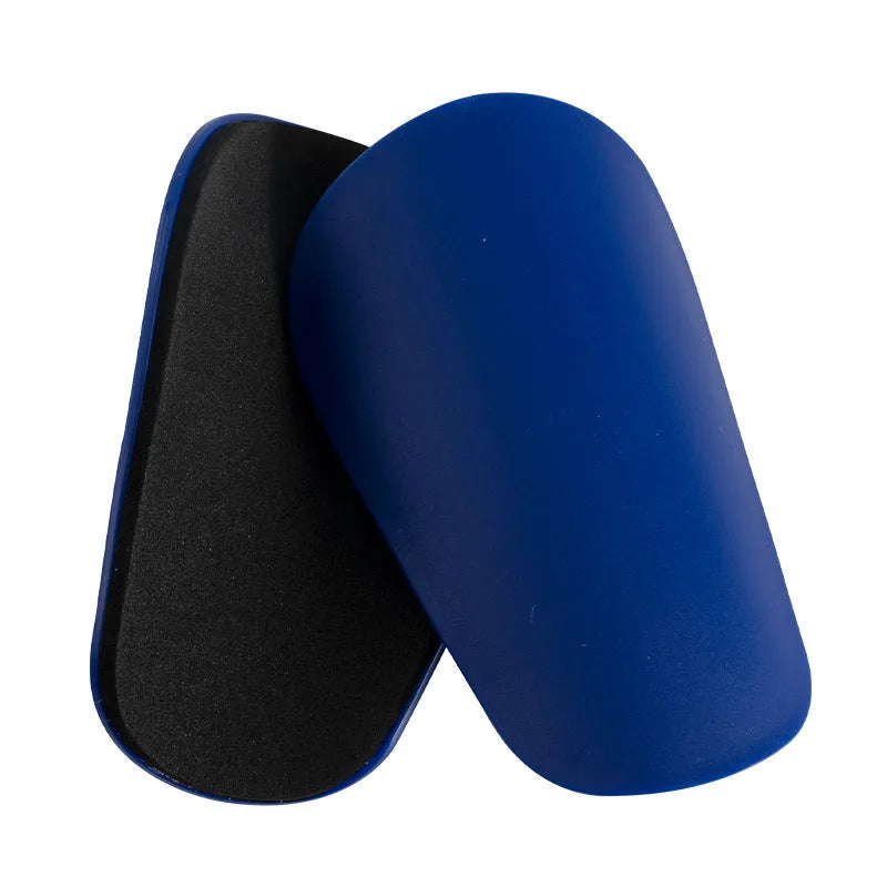 PU mini shin guards in black, white, red and blue for football and outdoor sports