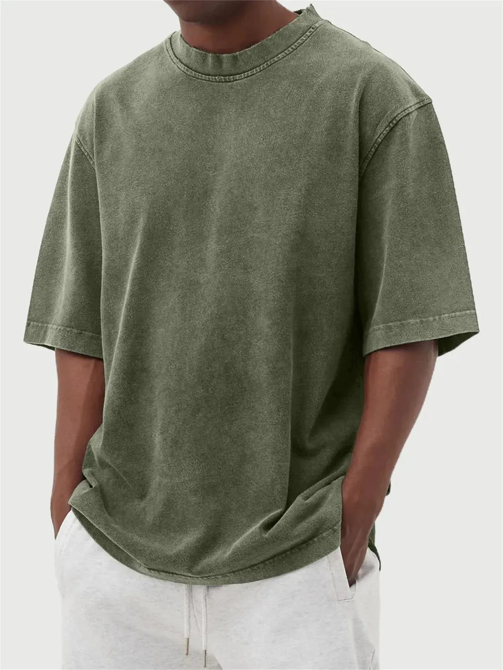 Men's stonewash distressed polyester pullover T-shirt in solid colour with loose fit and half sleeves