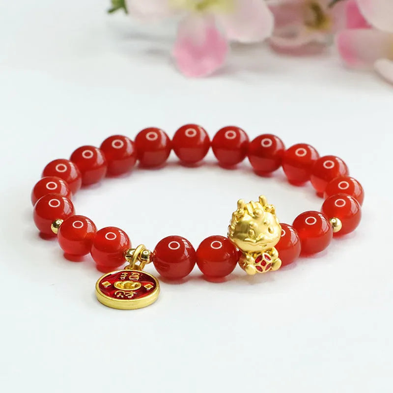 Red agate Chinese zodiac dragon bracelet with 8mm round beads on an adjustable cord.