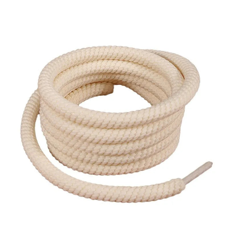 Solid colour round woven shoelaces showing white, black, and beige options with length and thickness choices