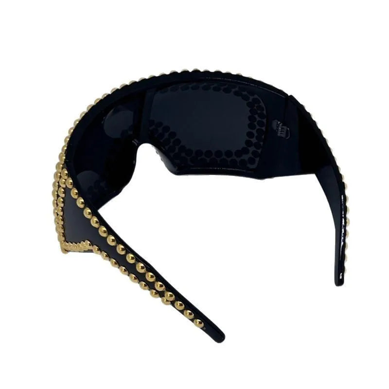 Men's punk style sunglasses with super large square frame and metal rivet details in gold colour