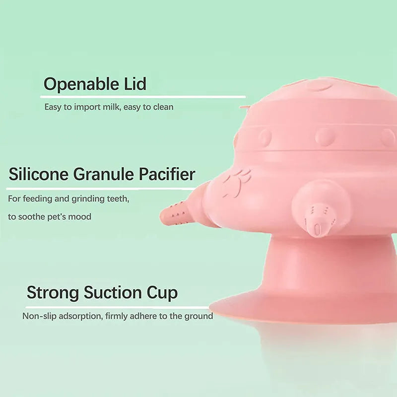 Pink silicone pet milk feeder with bionic breast design and four pacifiers for puppies and kittens
