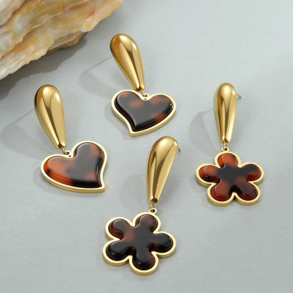 Tortoiseshell resin hawksbill colour earrings with 18K gold plating on stainless steel, showing heart and flower geometric designs