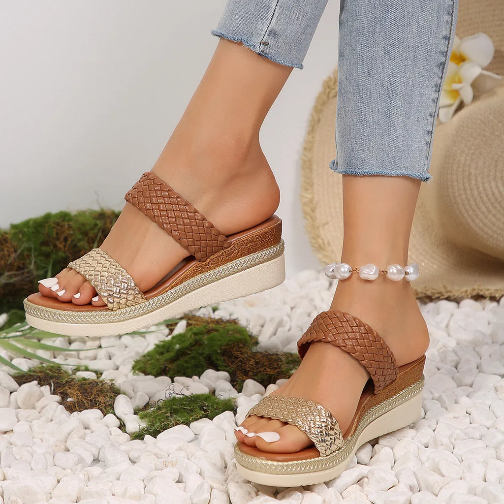 Women's metallic gold wedge sandals with a PU upper and rubber sole, shown in a larger size.