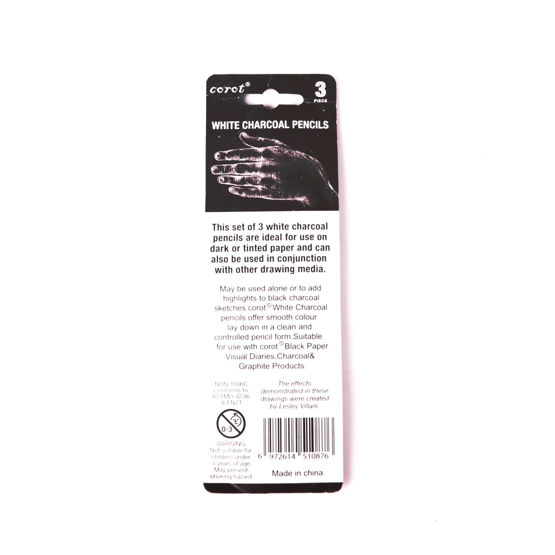 Set of three white charcoal highlighting pencils with wooden shells and brush tips for drawing