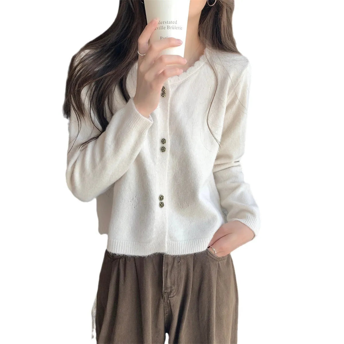 Women's long sleeved acrylic cardigan coat in light purple, free size.