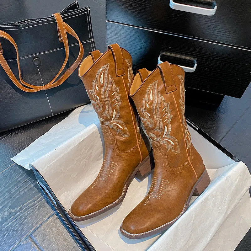 Brown women's embroidered Martin boots with leather lining, low square heel, and waterproof platform sole.