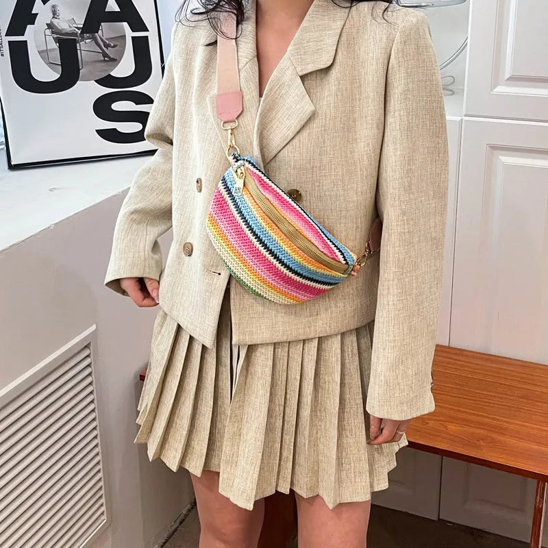 Blue and pink woven straw beach bag with shell shape and single shoulder strap
