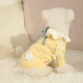 Yellow XINGX style dog sweater on small breed dog showing chest measurement and acrylic fabric