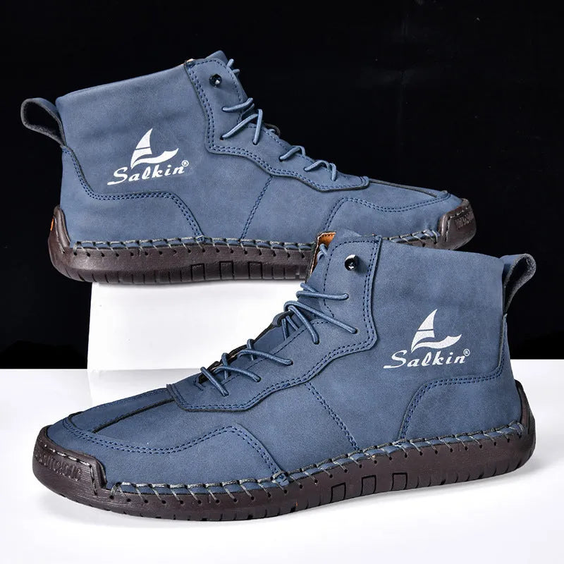 Men's dark blue retro high-top casual boots with lace-up front and elastic band on a white background.