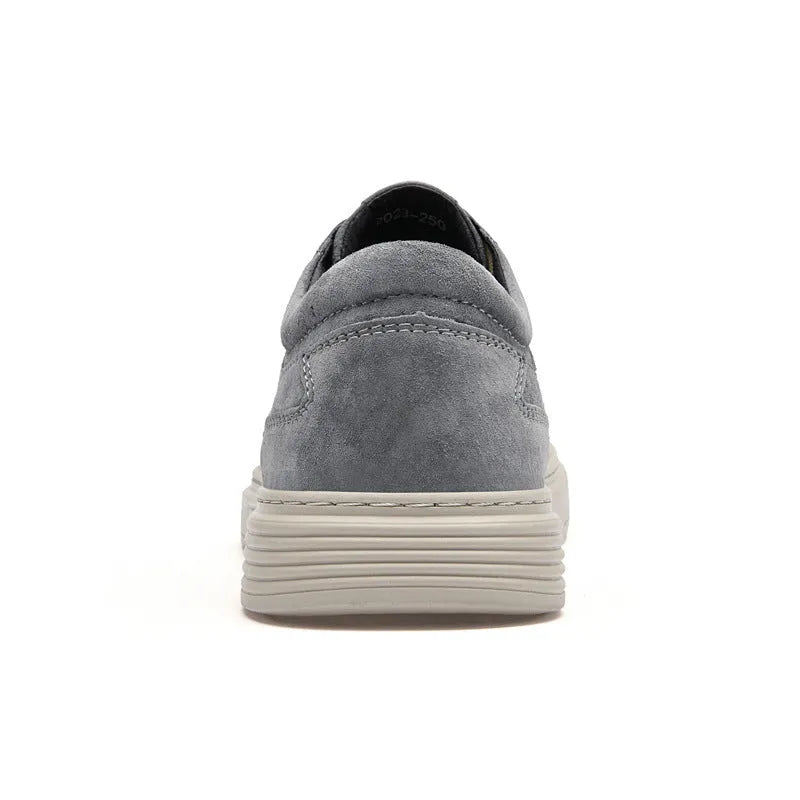 Men's grey casual leather skate shoes with round toe design and rubber sole