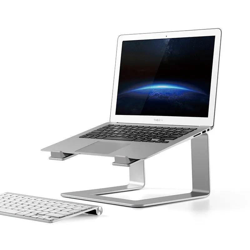 Black aluminium alloy laptop stand on a desk, showing its size and solid base plate.