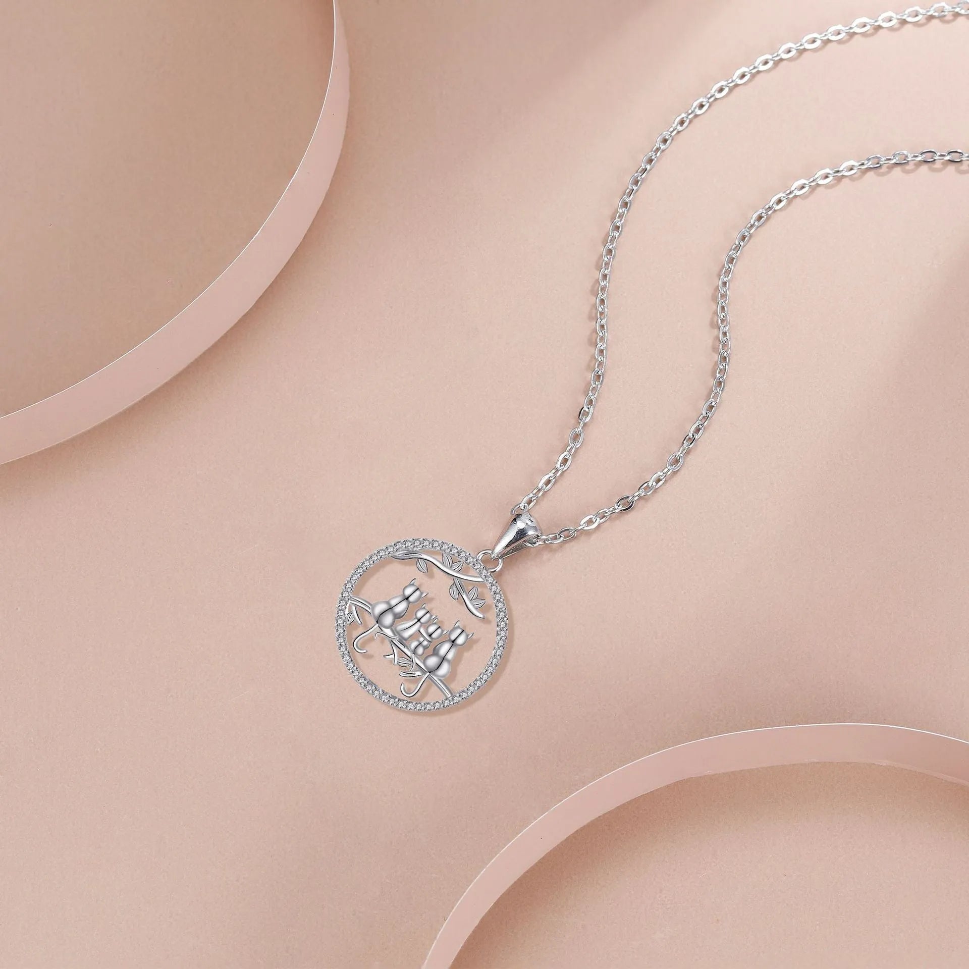 Original design four kitten copper pendant necklace with a cross chain style.