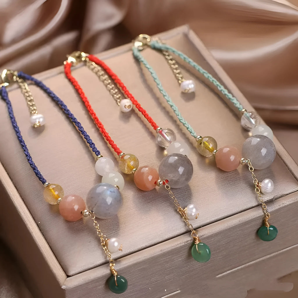Hand-woven crystal sequin bracelet with peace buckle closure in blue, green and red colour options