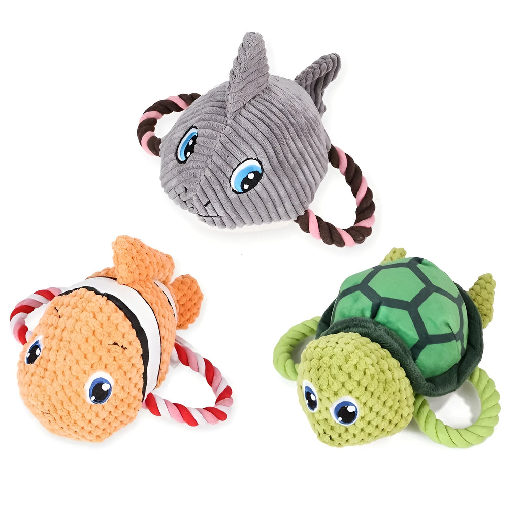 Turtle-shaped plush dog chewing toy with squeaker and hidden knot construction