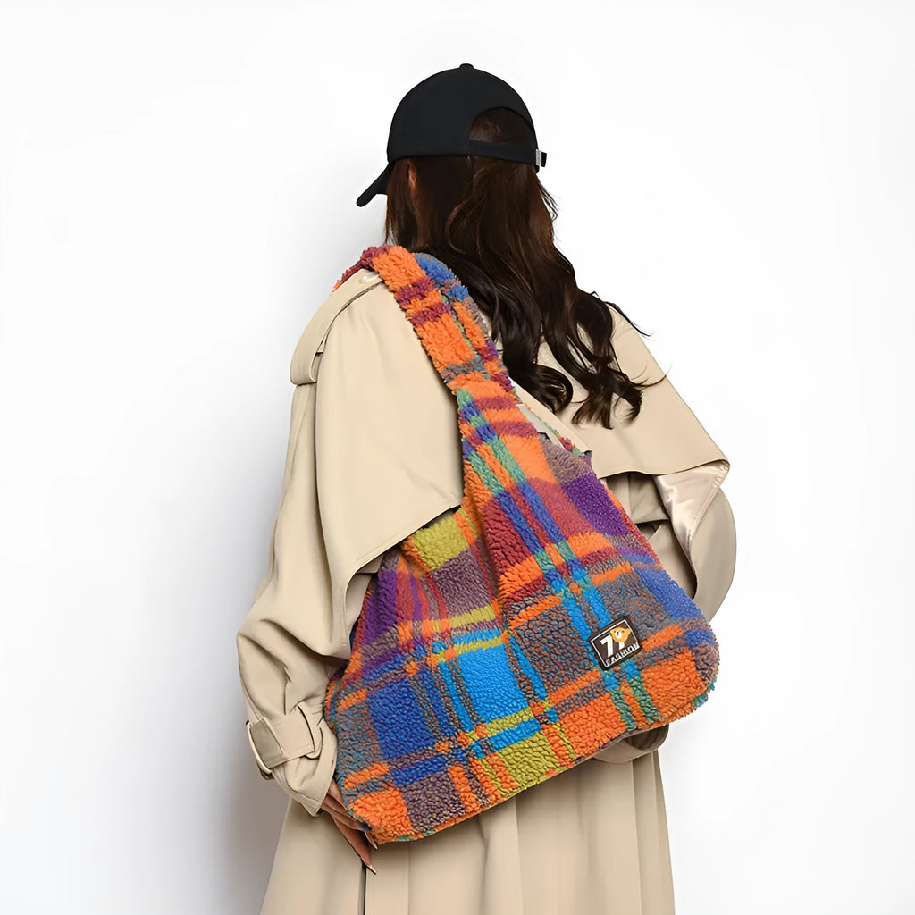 Women's plaid crossbody tote bag in soft plush material with shoulder strap and zippered compartment