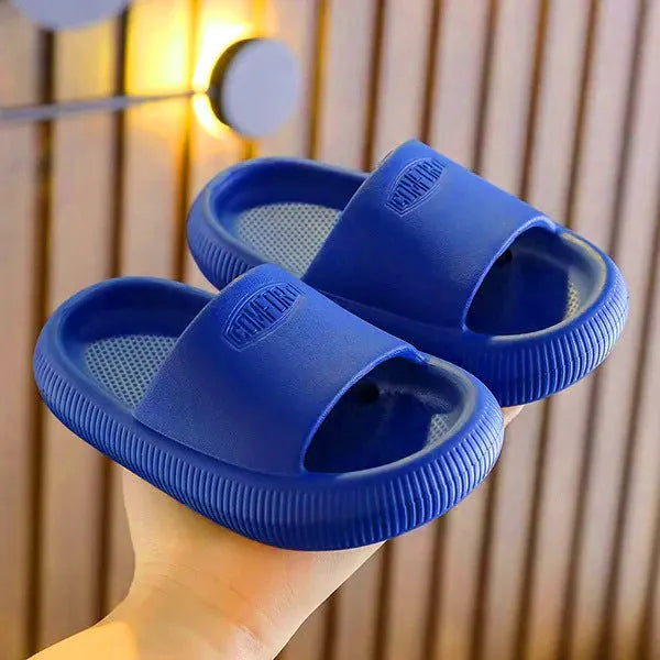 Children's mixed colour EVA slippers with non-slip soles showing 1.5cm thickness