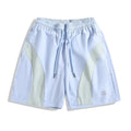 Black and grey loose fit sports shorts with elasticated waistband and tie closure