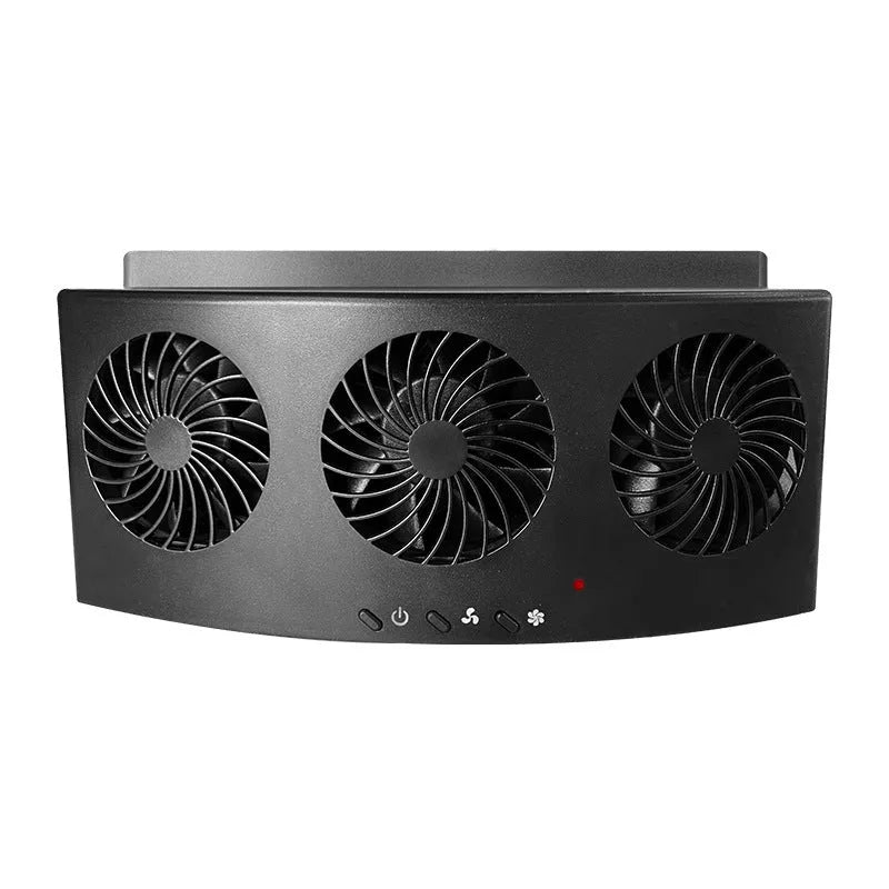 Black and white car ventilation fan with USB power cord on a car dashboard.