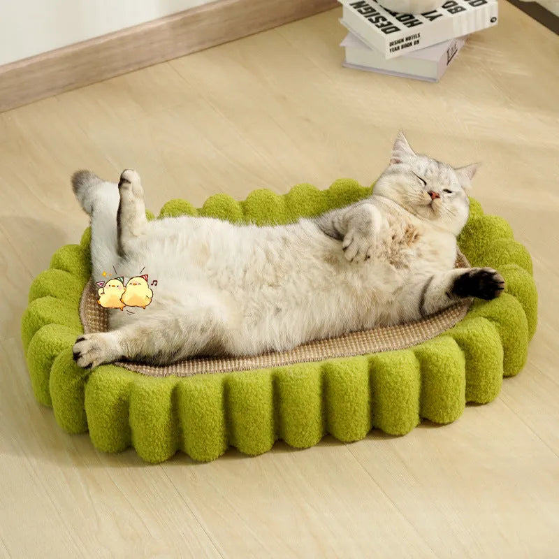 Green oval cat scratcher bed with sisal surface, showing bowl shape for scratching and sleeping