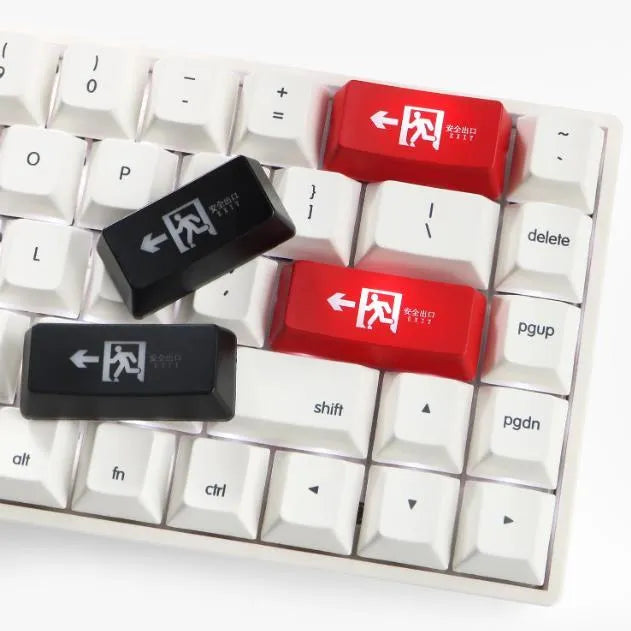 Transparent mechanical keyboard keycap with safety evacuation exit graphic in red text