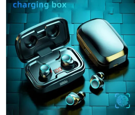 Black wireless Bluetooth earpieces with their plastic charging case on a table