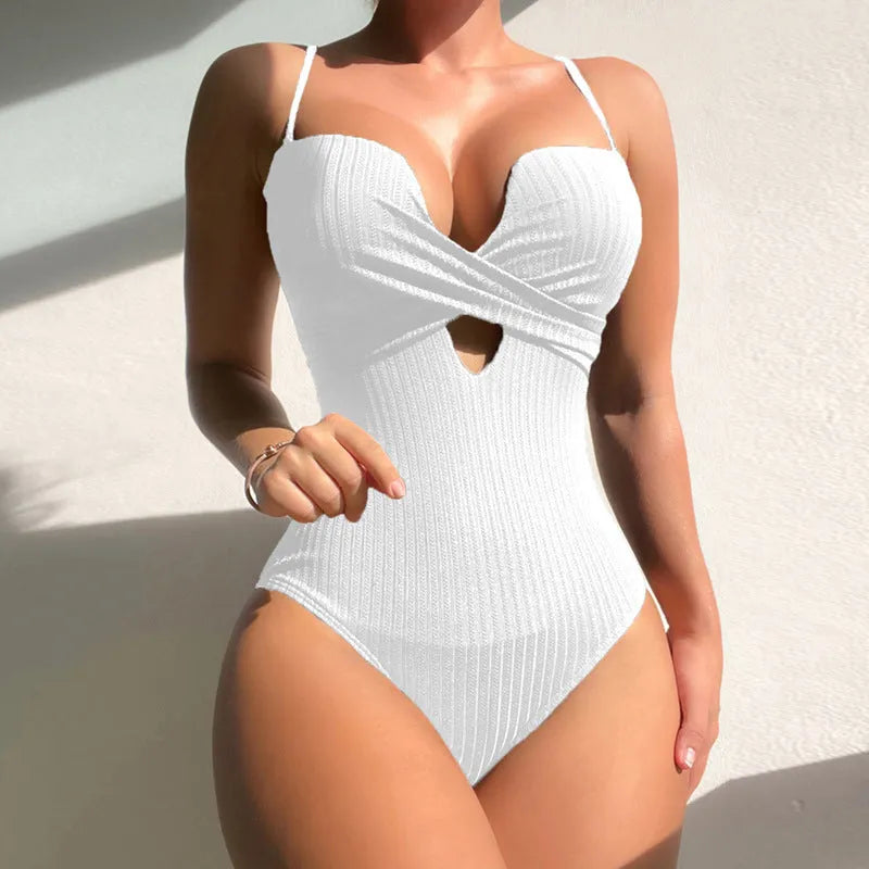 Women's solid colour one-piece swimsuit in polyester fabric available in white, burgundy and rose red